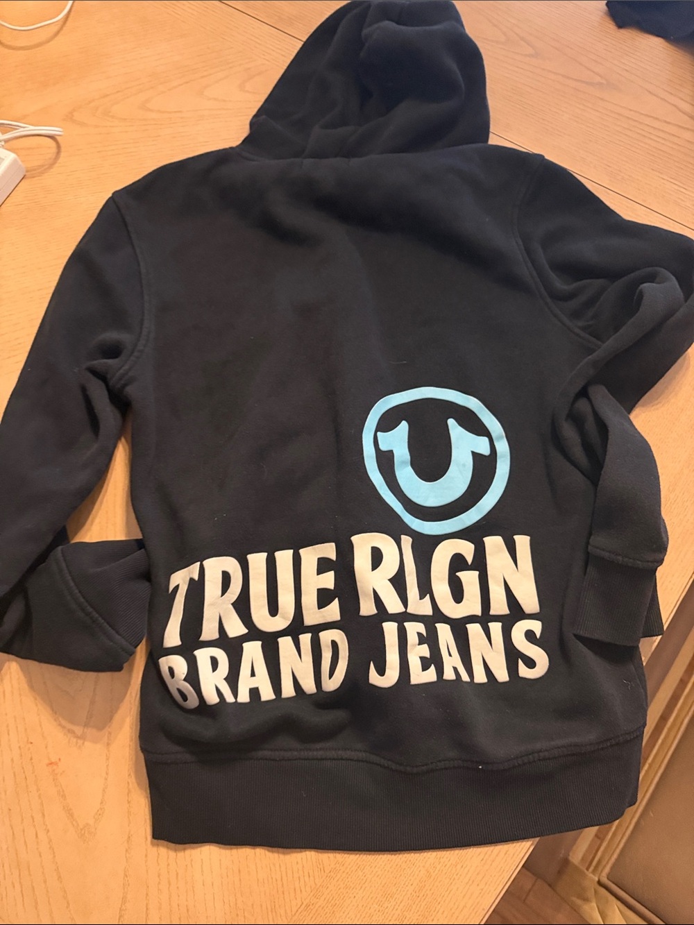 True Religion Black Hoodie with Light Blue Logo and White Text